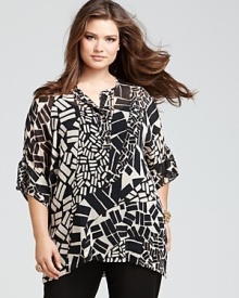 Update your print portfolio in this gossamer Lafayette 148 New York top, cut in a flowing silhouette and emboldened in a graphic geometric pattern. Update your print portfolio in this gossamer Lafayette 148 New York top, cut in a flowing silhouette and emboldened in a graphic geometric pattern.