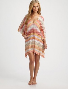 A delicately designed coverup with gorgeous colors and details.ScoopneckDolman sleevesRayonHand washMade in Italy A delicately designed coverup with gorgeous colors and details.ScoopneckDolman sleevesRayonHand washMade in Italy