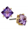 Juicy Couture's gorgeous stud earrings feature pyramid-cut, purple-colored cubic zirconias. Crafted in gold tone mixed metal. Approximate diameter: 1/3 inch.