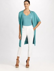 This long, fine-knit silk style drapes beautifully over the body.Open frontRib-knit edges and hemlineThree-quarter dolman sleevesSilkDry cleanImportedModel shown is 5'9 (175cm) wearing US size Small. This long, fine-knit silk style drapes beautifully over the body.Open frontRib-knit edges and hemlineThree-quarter dolman sleevesSilkDry cleanImportedModel shown is 5'9 (175cm) wearing US size Small.