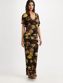A gorgeous floral print with a curve-hugging maxi-dress fit creating a stunning and elongating coverup. V-neckShort sleevesPull-on style87% nylon/13% spandexHand washImported A gorgeous floral print with a curve-hugging maxi-dress fit creating a stunning and elongating coverup. V-neckShort sleevesPull-on style87% nylon/13% spandexHand washImported