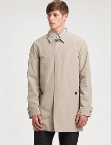 An iconic Burberry Brit style featuring a button front, convenient front pockets and a back vent.Collar neckButton-tab on long sleevesButtoned flap pocketsBack ventFully linedAbout 36 from shoulder to hemPolyesterMachine washImported An iconic Burberry Brit style featuring a button front, convenient front pockets and a back vent.Collar neckButton-tab on long sleevesButtoned flap pocketsBack ventFully linedAbout 36 from shoulder to hemPolyesterMachine washImported