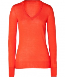 Building a coveted capsule wardrobe is easy with stylish staples like Iris von Arnims chili orange pullover - Sumptuously soft in a luxe, lighter weight merino wool knit - Fitted, feminine cut tapers gently through waist and hits below hips - Long sleeves and flattering v-neck - Oversize rib trim at cuffs and hem - Versatile and classically chic, seamlessly transitions from work to weekend - Pair with everything from suit trousers and pencil skirts to skinny denim and leather pants