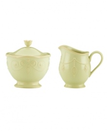 With fanciful beading and a feminine edge, this Lenox French Perle sugar and creamer set has an irresistibly old-fashioned sensibility. Hardwearing stoneware is dishwasher safe and, in a soft pistachio hue with antiqued trim, a graceful addition to any meal. Qualifies for Rebate With fanciful beading and a feminine edge, this Lenox French Perle sugar and creamer set has an irresistibly old-fashioned sensibility. Hardwearing stoneware is dishwasher safe and, in a soft pistachio hue with antiqued trim, a graceful addition to any meal. Qualifies for Rebate