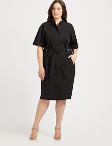 A relaxed-yet-structured fit, with just the right amount of stretch, lends fashion-forward appeal to this must-have sheath.Stand collarShort sleevesFront zipperSelf-tie beltWelt pocketsSide zipperAbout 25 from natural waist72% cotton/23% polyamide/5% Lycra®Dry cleanImported of Italian fabric