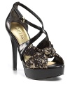 Gold and black lace adds a little romance to these show-stopping platform sandals. By GUESS.