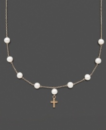 The perfect First Communion gift for a special little girl. This necklace features cultured freshwater pearls (5-6 mm) and a petite 14k gold cross charm. Set in 14k gold. Approximate length: 13 inches. Approximate drop: 1/2 inch. The perfect First Communion gift for a special little girl. This necklace features cultured freshwater pearls (5-6 mm) and a petite 14k gold cross charm. Set in 14k gold. Approximate length: 13 inches. Approximate drop: 1/2 inch.