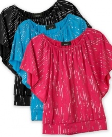 Shiny stripes. She can dress up her look with this sequin top from BCX to show off her fun style.