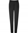Elegant pant in fine, pure black viscose - Lean silhouette is slightly fuller through thighs and tapers at legs - Flattering and elongating crease detail extends from hip to hem - Medium rise, with tab waist, belt loops and slash pockets at sides - Polished and ultra-versatile, ideal for work and evenings out - Pair with a blazer, silk blouse or sequin top and platform pumps