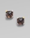 From the Linen Collection. A small cushion-cut smokey quartz stone shimmers in a sterling silver and 18K gold setting.Smokey quartz 18K gold Sterling silver Width, about ¼ Post backs Imported 