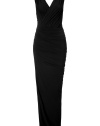 The ultimate figure-hugging dress, this draped Donna Karan favorite will have you turning heads while maintaining comfort - V-neckline with faux wrap detail, sleeveless, front and back twist drape detail, fitted pencil silhouette, dramatic maxi length - Style with statement sandals, a draped front leather jacket, and a studded clutch