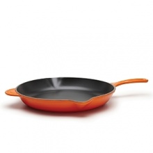 Turn out restaurant-caliber frittatas and gold-star gravies. This skillet has a cast iron exterior for uniform heating, and a black enamel interior that seals in juices. Dual pour spouts accommodate right- or left-handers. Turn out restaurant-caliber frittatas and gold-star gravies. This skillet has a cast iron exterior for uniform heating, and a black enamel interior that seals in juices. Dual pour spouts accommodate right- or left-handers.