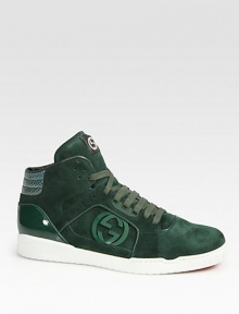 Green suede with green python on heel.Interlocking G detail at sidesPadded back ankleGucci logo embossed rubber soleMade in Italy Green suede with green python on heel.Interlocking G detail at sidesPadded back ankleGucci logo embossed rubber soleMade in Italy