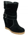 A stylish take on a fall essential! A mid-height, slouchy suede bootie with a subtle wedge and chic silhouette.