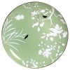 This Limoges porcelain dinner service was created by the well-known designer Sylvie Langet for Raynaud. The leaf design and the bird silhouettes are reminiscent of the golden era of past styles. The fresh colors evoke a feeling of hospitality and the lightness of an early summer day. The clever interplay of positive and negative color highlights the design very effectively. The birds decorate the individual pieces of the dinner service in black, white or gold - to match the rims.