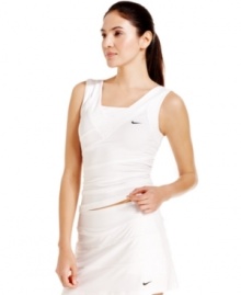 A fitted, sleek silhouette in Dri-FIT fabric makes this Nike tank top a smart choice for all kinds of activities, from tennis to running. It offers stylish, breathable comfort -- on the courts and off!