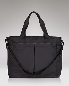 A durable nylon baby bag with changing pad from LeSportsac. A durable nylon baby bag with changing pad from LeSportsac.