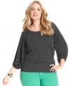 Get spotted this season in MICHAEL Michael Kors' three-quarter-sleeve plus size top, featuring a polka-dot print!