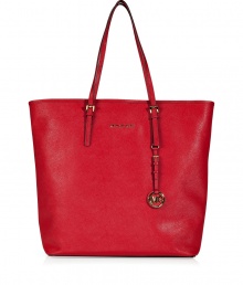 Sophisticated with simple, clean lines, MICHAEL Michael Kors textured leather tote is an elegant and versatile choice - Flat double top handles with buckle detail at base, metal logo on front, logo charm attached to handle, inside zippered back wall pocket, front wall slot pocket, cinch strap, strap with clip attached for keys - The perfect choice for work, school or running errands Sophisticated with simple, clean lines, MICHAEL Michael Kors textured leather tote is an elegant and versatile choice - Flat double top handles with buckle detail at base, metal logo on front, logo charm attached to handle, inside zippered back wall pocket, front wall slot pocket, cinch strap, strap with clip attached for keys - The perfect choice for work, school or running errands