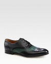 Leather lace-up with brogueings.Leather soleMade in Italy