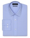 Dress shirt with spread collar, two button barrel cuffs and a slimmer fit through the body, with a solid blue hue.