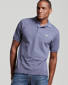 Lacoste's modern classic looks better than ever. The 2 button polo with the iconic alligator logo at the left chest.