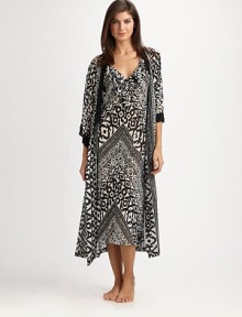 EXCLUSIVELY AT SAKS. Opposites attract in this flowy design featuring a striking tribal-inspired print. V-neckThree-quarter length sleevesSolid trim at the neckline and cuffsSelf-tie waistAbout 53 from shoulder to hemPolyesterMachine washImported EXCLUSIVELY AT SAKS. Opposites attract in this flowy design featuring a striking tribal-inspired print. V-neckThree-quarter length sleevesSolid trim at the neckline and cuffsSelf-tie waistAbout 53 from shoulder to hemPolyesterMachine washImported