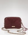 Ultra cute with a rebellious side. Carry coquettish style with this leather crossbody bag from Rebecca Minkoff.