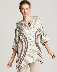 A silk tunic like this Lafayette 148 New York printed top is an effortless wardrobe essential -- simply pair over slim pants that complement the muted palette of the swirling mosaic pattern.