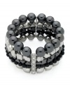 Shapes and sparkle and stretch. GUESS delivers style with this five-strand Jet bracelet featuring hematite-plated pieces and crystal accents. Stretches to fit wrist. Approximate diameter: 2-1/4 inches inches.