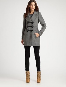 Oversized toggles give this wool coat a refreshing, military-inspired effect.Notched collarEpaulettesToggle closureFlap pocketsBack ventFully linedAbout 31 from shoulder to hemBody: woolLining: cottonDry cleanImported Model shown is 5'10 (177cm) wearing US size 4. Oversized toggles give this wool coat a refreshing, military-inspired effect.Notched collarEpaulettesToggle closureFlap pocketsBack ventFully linedAbout 31 from shoulder to hemBody: woolLining: cottonDry cleanImported Model shown is 5'10 (177cm) wearing US size 4.