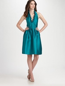 This ruffled, festive halter silhouette is rendered in lustrous, colorful gazar.Ruffled halter necklineSleevelessFront and back dartsFull skirtConcealed back zipFully linedAbout 23 from natural waistPolyesterDry cleanMade in USA of imported fabricModel shown is 5'10 (177cm) wearing US size 2. This ruffled, festive halter silhouette is rendered in lustrous, colorful gazar.Ruffled halter necklineSleevelessFront and back dartsFull skirtConcealed back zipFully linedAbout 23 from natural waistPolyesterDry cleanMade in USA of imported fabricModel shown is 5'10 (177cm) wearing US size 2.