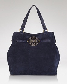 A poised and practical tote in buttery soft suede - every uptown girl needs one. Sling this Tory Burch carryall over the shoulder for exemplary citified style. A poised and practical tote in buttery soft suede - every uptown girl needs one. Sling this Tory Burch carryall over the shoulder for exemplary citified style.