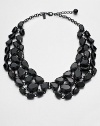 A pretty cluster of faceted stones in a collar formation for a truly whimsical look. Plastic stonesBrassLength, about 18Lobster clasp closureImported 