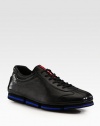 Sleek and sporty lace-up design rendered in Italian calfkskin leather.Leather upperPadded insoleRubber soleImported