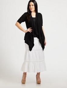 Swing into this tiered, cotton skirt for a bohemian-inspired look. It features a comfortable, elasticized waist and gorgeous crochet. Elasticized waistCrochet-trimmed tiersAbout 38 longCottonHand washImported