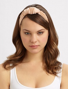 Washed silk fashioned into a knotted turban shape with just a hint of stretch.About 3 wide Silk; dry clean Made in USA Washed silk fashioned into a knotted turban shape with just a hint of stretch.About 3 wide Silk; dry clean Made in USA