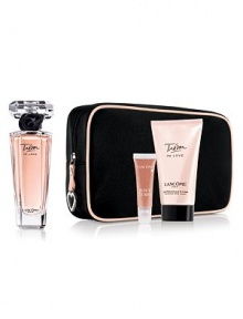 Youthful. Modern. Flirty. Trésor in Love captures the spirit of the first moment of love. Fall head over heels with the luminosity of ripe fruits, the radiance of rose and jasmine, and the vibrant warmth of cedar wood and musk. Juicy Tubes is an ultra shiny gloss that sweeps on a sheer, sexy wash of color. Set includes: 1.7 oz. Eau de Parfum, 1.7 oz. Perfumed Body Lotion, 0.33 oz. Juicy Tubes in Hallucination, and a chic cosmetics bag. Youthful. Modern. Flirty. Trésor in Love captures the spirit of the first moment of love. Fall head over heels with the luminosity of ripe fruits, the radiance of rose and jasmine, and the vibrant warmth of cedar wood and musk. Juicy Tubes is an ultra shiny gloss that sweeps on a sheer, sexy wash of color. Set includes: 1.7 oz. Eau de Parfum, 1.7 oz. Perfumed Body Lotion, 0.33 oz. Juicy Tubes in Hallucination, and a chic cosmetics bag.