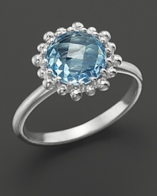 Blue topaz set in sterling silver. By Anzie. Blue topaz set in sterling silver. By Anzie.