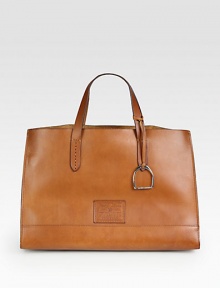 A style inspired by classic Americana in smooth leather.Double top handles, 5½ dropTab closureOne detachable zip pouch16W X 11H X 8½DImported A style inspired by classic Americana in smooth leather.Double top handles, 5½ dropTab closureOne detachable zip pouch16W X 11H X 8½DImported