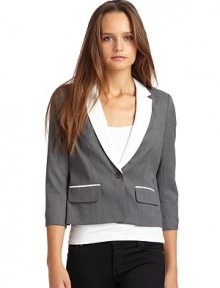 THE LOOKPadded shouldersNotched lapelButton closureDual flap pocketsCropped sleeves with button cuffsAsymmetric slit in backTHE FITAbout 20 from shoulder to hemTHE MATERIALBody: wool/polyesterCombo: triacetate/polyesterFully linedCARE & ORIGINDry cleanMade in USAModel shown is 5'11 (180cm) wearing US size 4. THE LOOKPadded shouldersNotched lapelButton closureDual flap pocketsCropped sleeves with button cuffsAsymmetric slit in backTHE FITAbout 20 from shoulder to hemTHE MATERIALBody: wool/polyesterCombo: triacetate/polyesterFully linedCARE & ORIGINDry cleanMade in USAModel shown is 5'11 (180cm) wearing US size 4.
