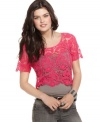 Add artisanal value to your day ensemble with this super cute, crochet crop top from Say What?.