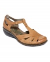 Completely cute. Easy Spirit's Prestah sandals feature crisscross detail at the vamp and a darling t-strap.