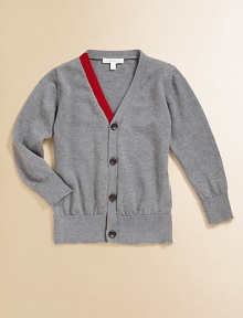 The essential knit cardigan is rendered in ultra-soft merino wool with a contrasting stripe.V-neckLong sleevesButton-frontRibbed cuffs and hemMerino woolDry cleanImported Please note: Number of buttons may vary depending on size ordered. The essential knit cardigan is rendered in ultra-soft merino wool with a contrasting stripe.V-neckLong sleevesButton-frontRibbed cuffs and hemMerino woolDry cleanImported Please note: Number of buttons may vary depending on size ordered.