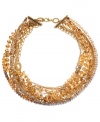 Versatile style. With its neutral champagne palette, c.A.K.e. by Ali Khan's chic collar necklace is both strikingly stylish and easy to mix and match within your wardrobe. Featuring faceted rondelle glass accents, it's made in gold tone mixed metal. Approximate length: 18 inches + 3-inch extender.