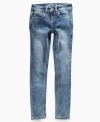 Stylish stitching. She can turn her wardrobe on its head in these skinny jeans from Revolution, with star pockets for style.