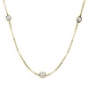 Glamour for miles. CRISLU's luxurious long necklace features bezel-set, round-cut cubic zirconias (3-1/4 ct. t.w.) strung from a delicate chain. Crafted in 18k gold over sterling silver. Approximate length: 36 inches + 2-inch extender.