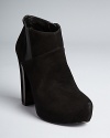 With gored accents, the Coreline booties from GUESS show off with a fashion-forward design, boasting inset hardware at the heel.