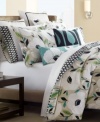 Flower power! White poppy appliques refresh your bed in modern style with this bold decorative pillow from Echo. Featuring pure cotton and zipper closure.