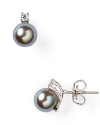 In a cool hue, Majorica's gray pearl earrings are dark, stormy and seriously chic. Slip them in as an alternative to classic whites.